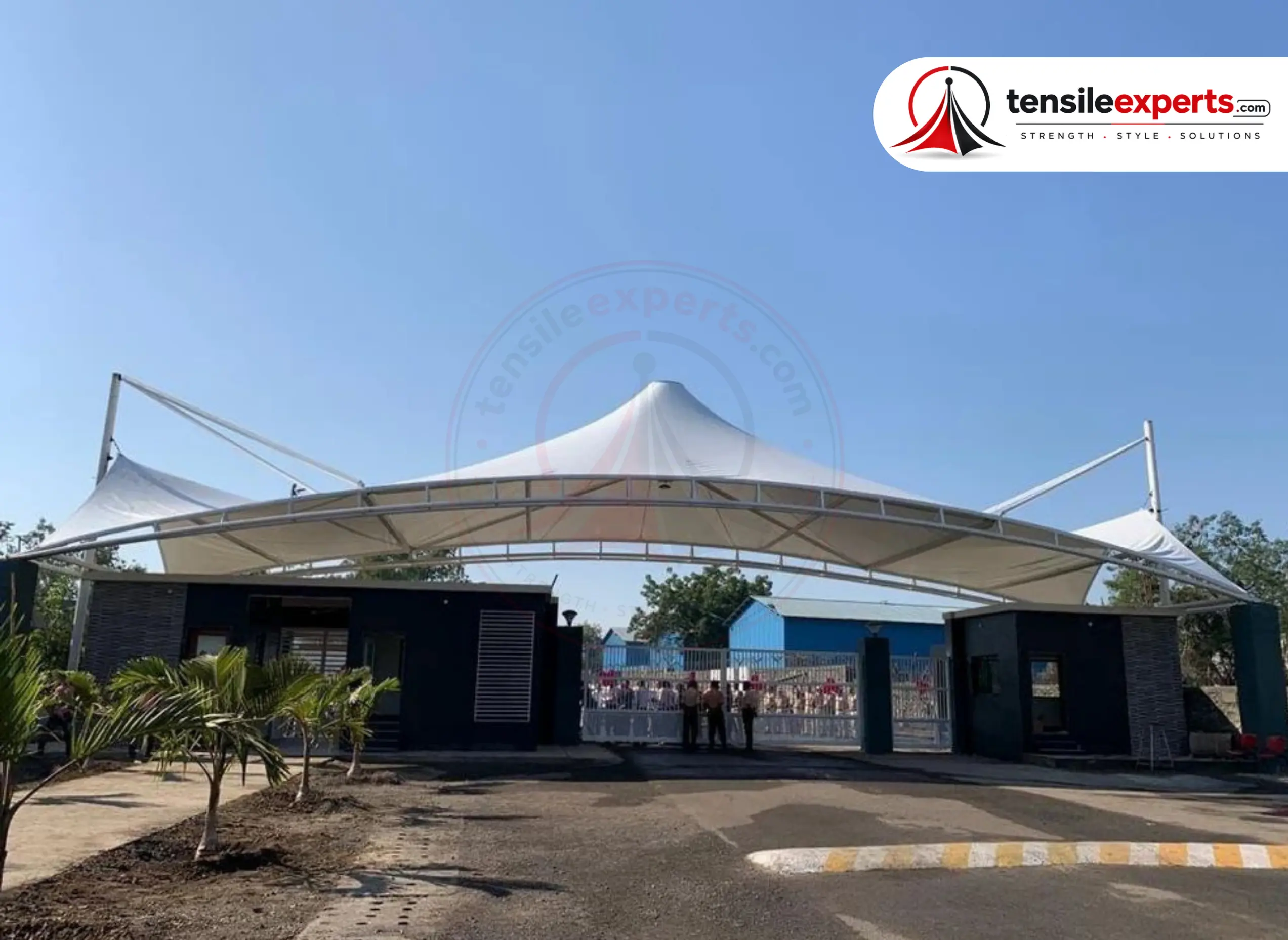 A modular tensile structure — repeating bays that can extend as a production floor grows.