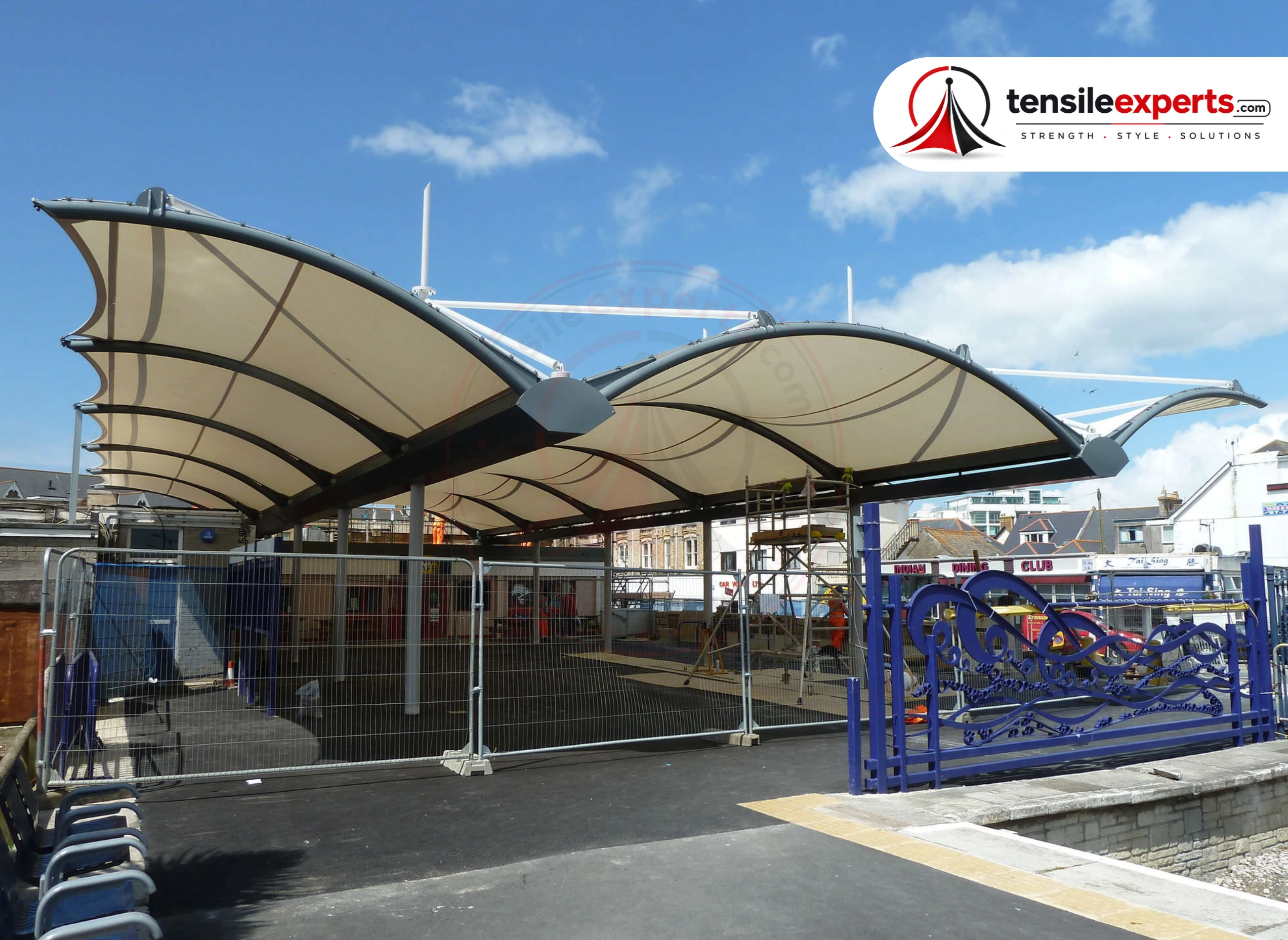 A tensile canopy structure — the same structural form used for petrol pump forecourt coverage.