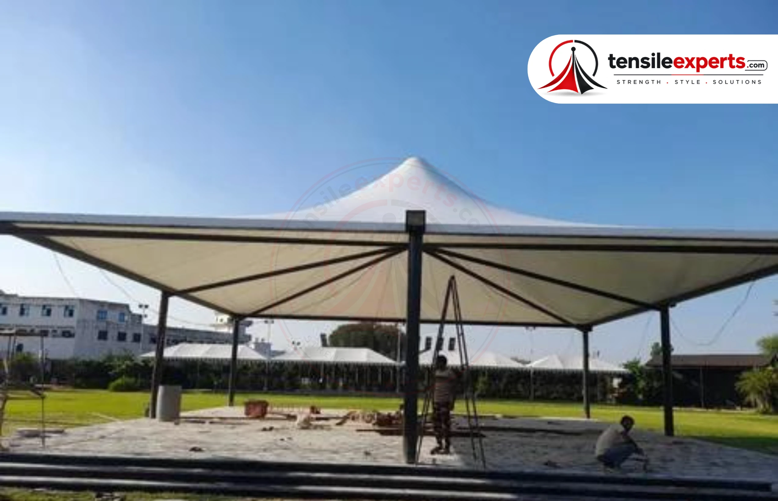 A tensile gazebo — a common standalone feature for Delhi farmhouse gardens and lawns.
