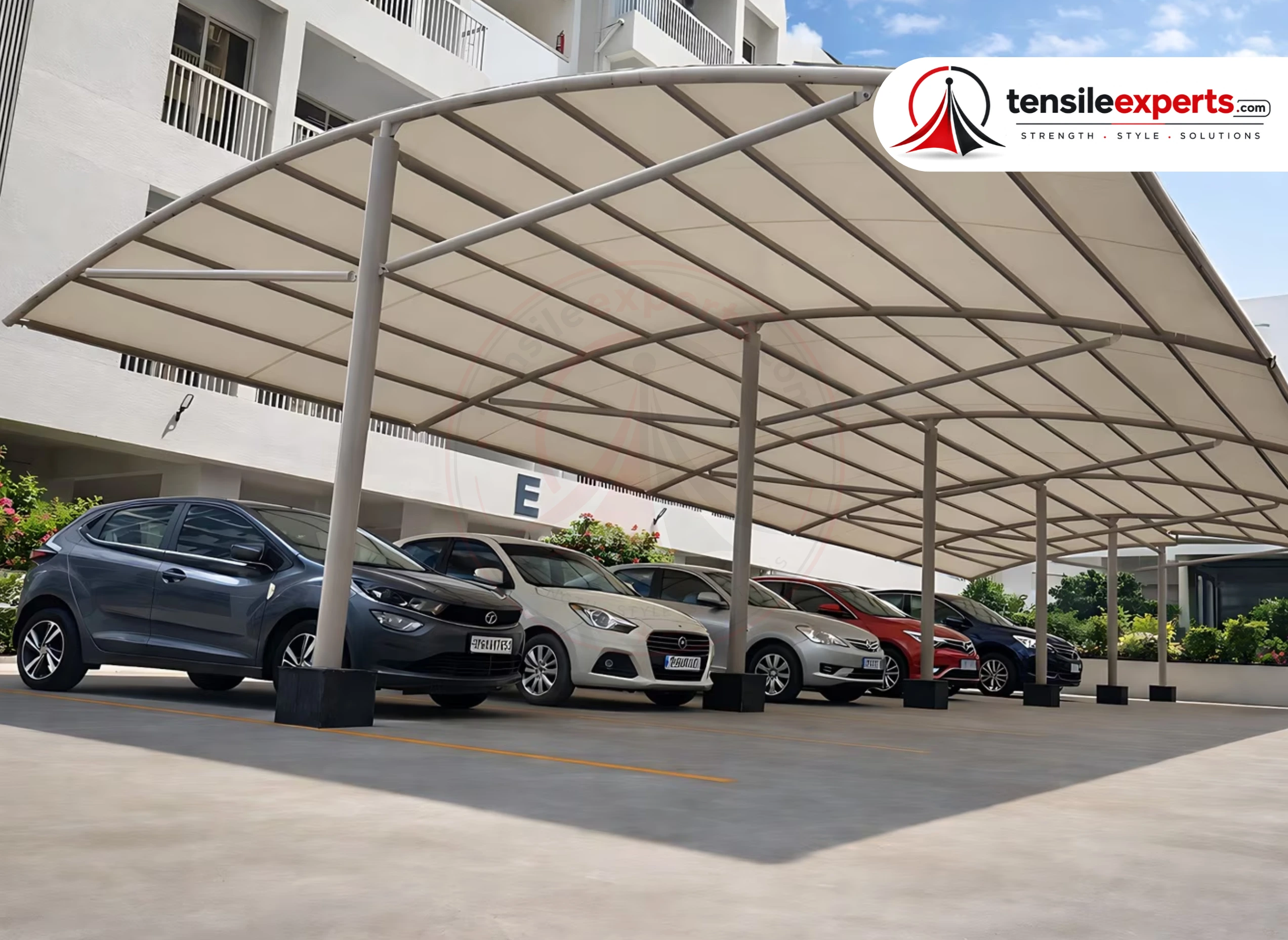 Triple-cone tensile parking canopy completed by Tensile Experts