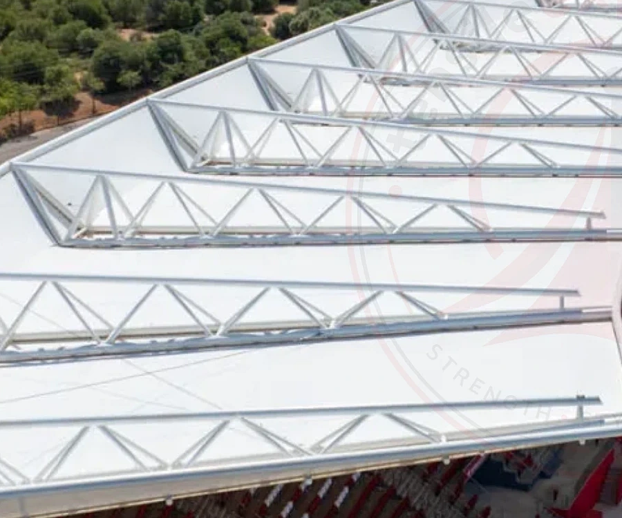Close-up of steel truss connection nodes on a tensile structure roof